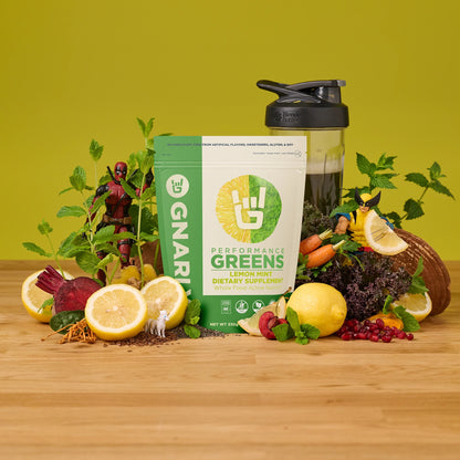Gnarly Performance greens Lemon Mint Dietary supplement surrounded by health super foods